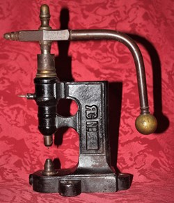 Presse à œillets R.G. de ganterie