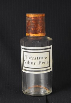 Flacon en verre très petit modèle étiquette blanche Pharmacie RAVASSE