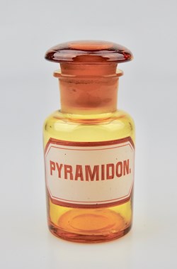 Flacon de pharmacie en verre ambré petit modèle à étiquette blanche et rouge