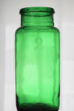 Flacon en verre de teinte verte