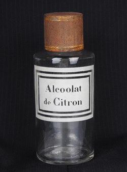 Flacon en verre petit modèle étiquette blanche Pharmacie RAVASSE