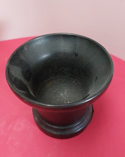 Mortier en fonte avec pilon