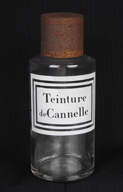 Flacon en verre petit modèle étiquette balnche Pharmacie RAVASSE