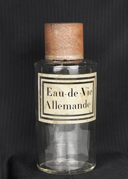Flacon en verre grand modèle étiquette blanche Pharmacie RAVASSE