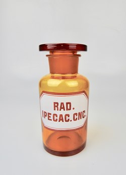 Flacon de pharmacie en verre ambré moyen modèle à étiquette blanche et rouge