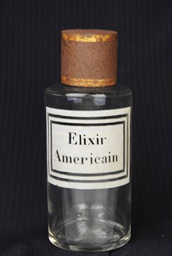 Flacon en verre petit modèle étiquette blanche Pharmacie RAVASSE