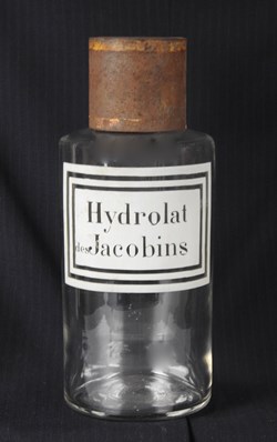 Flacon en verre grand modèle étiquette blanche Pharmacie RAVASSE