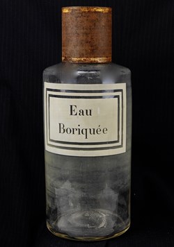 Flacon en verre très grand modèle étiquette blanche Pharmacie RAVASSE