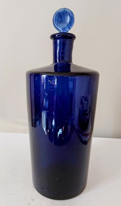 Bleu/ Flacon cylindrique de Pharmacie H. 25 cm