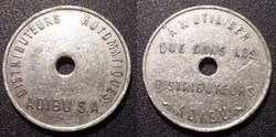 b- Jeton Distributeurs automatiques ADIBU S.A.