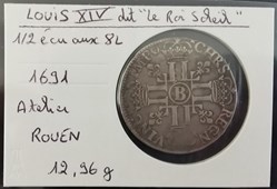 LOUIS XIV 1-2 écu aux 8L réformée 1691
