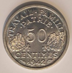 50 centimes 1942 première frappe aux croix dans les globules MS65