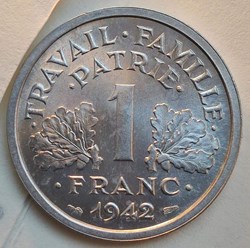 1 franc 1942 première frappe aux croix dans les globules MS65