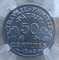 50 centimes 1942 première frappe aux croix dans les globules MS65