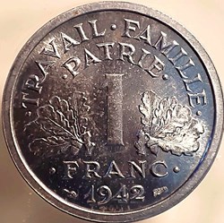 1 franc 1942 première frappe aux croix dans les globules MS65