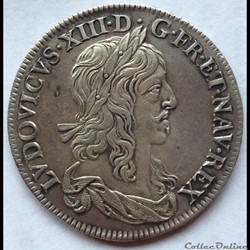 Demi écu de Warin 1er poinçon Louis XIII 1642 A rose