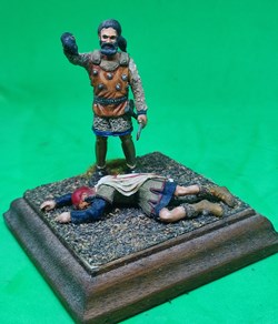 Guerrier Scythe scalpant un  homme