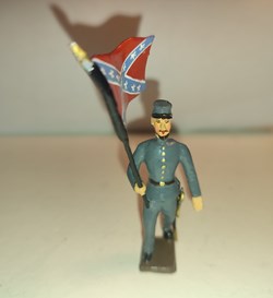 Soldat sudiste avec le drapeau de guerre confédéré