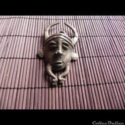 poids à or forme figurative masque