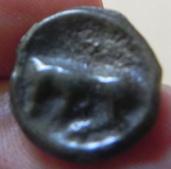potin Turons à la tête diabolique. monnaie d'inspiration lunaire