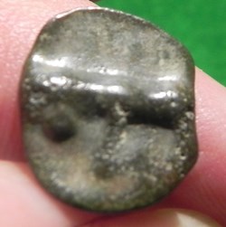 potin Turons à la tête diabolique. monnaie d'inspiration lunaire
