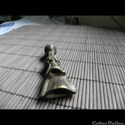 poids à or figuratif instrument de musique