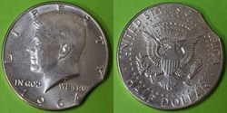 United States: 1964 silver Kennedy half dollar, clipped planchet error