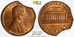 United States: 1969 bronze Lincoln Memorial cent, double clipped planchet error (PCGS MS64 RB)