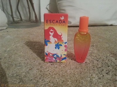 もも　ESCADA SUNSET HEAT 100ml Escada Sunset Heat Perfume for Women by Escada | FragranceX.com