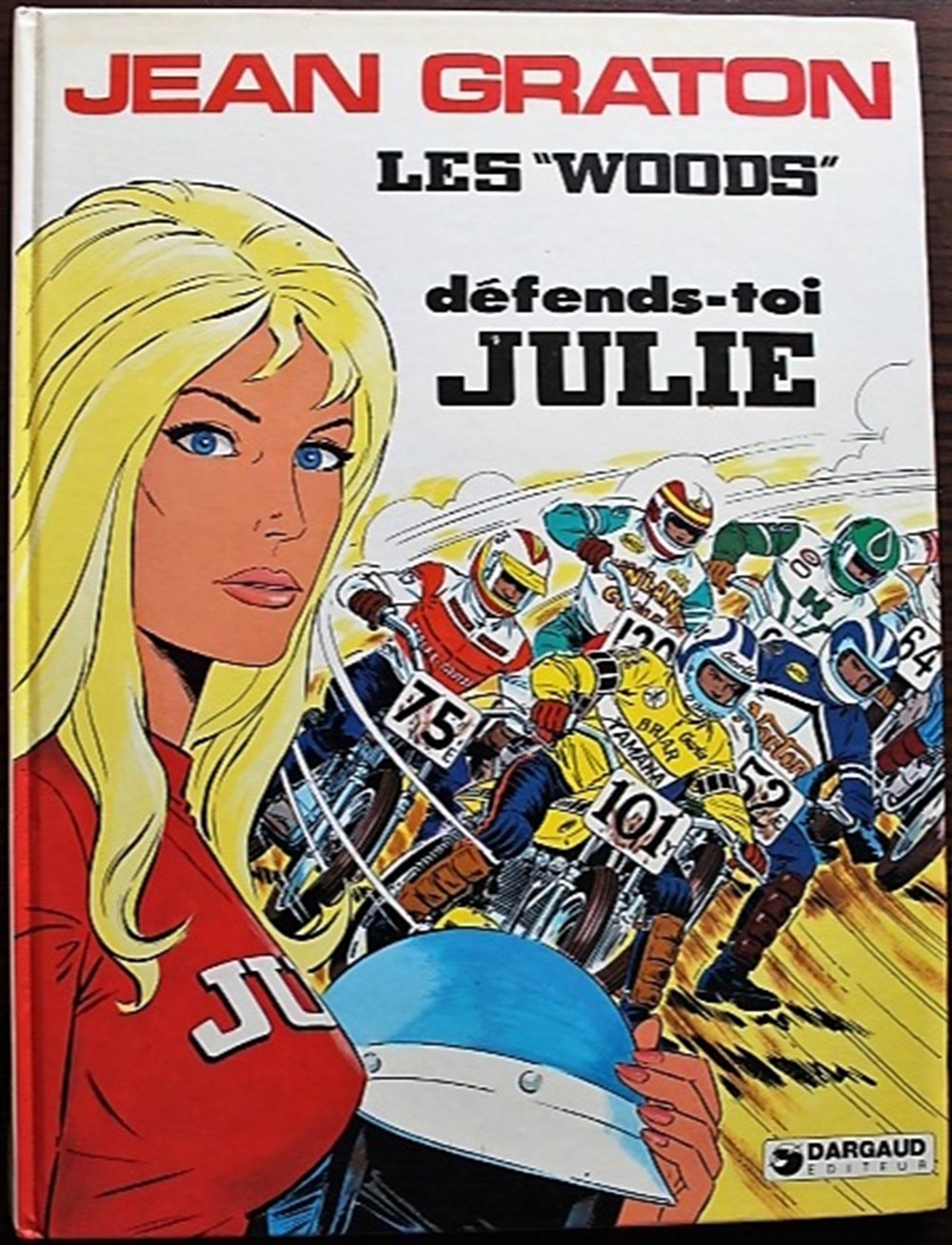  Julie Wood (du nom de son h&eacute;ro&iuml;ne) est une s&eacute;rie de Bande Dessin&eacute;e cr&eacute;&eacute;e par Jean Graton. Elle fait son apparition en 1976 dans le p&eacute;riodique de Bande Dessin&eacute;e...