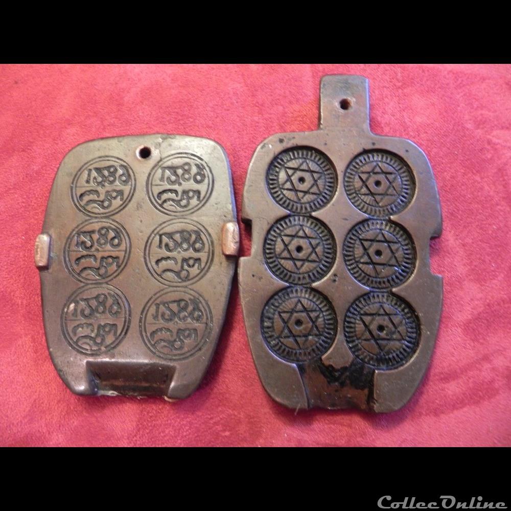 falus de maroc coin monnaies marocaines en bronze coulé et moule à monnaies (celui ci devait servir à couler une grape de cire). cette grape était par la suite utlisée pour la fabrication "en...